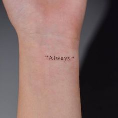 a wrist tattoo with the words always written on it