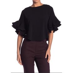 Details - Crew Neck - Short Wide Dolman Sleeves With Pleated Details - Back Zip Closure Fiber Content 100% Polyester Elegant Black Flutter Sleeve Blouse, Elegant Flutter Sleeve Top For Night Out, Chic Flutter Sleeve Blouse For Work, Chic Workwear Blouse With Flutter Sleeves, Elegant Black Flutter Sleeve Top, Chic Crew Neck Office Blouse, Black Ruffle Sleeve Blouse For Spring, Chic Black Office Top, Chic Blouse With Flutter Sleeves For Fall