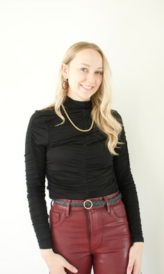 The Simone Turtleneck from Bishop + Young is a chic addition to any wardrobe. It is crafted from a soft, lightweight blend of 95% Rayon and 5% Spandex and features ruched detailing for an extra touch of style. It fits true to size, making it an easy and comfortable choice for any outfit. Chic Mock Neck Top For Fall Layering, Chic Ruched Tops For Fall, Chic Fall Tops With Ruched Detail, Stretch Mock Neck Top For Night Out In Fall, Fall Stretch Mock Neck Top For Night Out, Fitted Mock Neck Top For Fall Night Out, Fitted Mock Neck Top For Night Out In Fall, Chic Black Mock Neck Top For Spring, Chic Fitted Mock Neck Top For Night Out