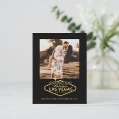 a black and gold las vegas wedding photo card