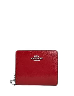 Patent leatherThree credit card slotsID windowFull-length bill compartmentSnap closureOutside zip coin pocket4 1/4" (L) x 3 1/2" (H) x 1" (W)Style No. CW790Color: Red Coach Red Bifold Wallet, Red Coach Wallet With Interior Card Slots, Red Coach Wallets With Interior Card Slots, Red Coach Leather Wallet, Red Leather Coach Wallet, Baby Bag Backpack, Snap Wallet, Crossbody Tote Bag, Crossbody Tote