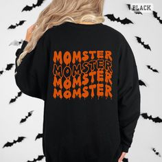 Momster Sweatshirt, Halloween Sweatshirt, Momster Halloween Sweatshirt, Funny Halloween Crewneck Sweatshirts for Women, Halloween Sweater, Halloween Shirts for Women, Halloween Gifts, Fall Sweatshirt, Halloween Mom Sweatshirt, Mombie ♥PRODUCTION TIME: 1-3 days (usually 2 days) ♥SHIPPING TIME: 2-5 days (usually 3 days) ♥PRODUCT DESCRIPTION: Gildan 18000 Unisex Sweater Super soft cotton and excellent quality print makes. 50% cotton, 50% polyester (fiber content may vary for different colors) Medium-heavy fabric blend (8.0 oz/yd² (271.25 g/m Runs true to size ♥ CARE INSTRUCTIONS: Machine wash: warm (max 30C or 90F); Non-chlorine: bleach as needed; Tumble dry: low heat; Don't iron; Do not dry clean ♥ PRINTING METHOD: DTG printing method is used for these Sweaters. A process of printing on text Black Halloween Graphic Print Sweatshirt, Black Halloween Sweatshirt With Crew Neck, Black Crew Neck Halloween Sweatshirt, Black Crew Neck Sweatshirt For Halloween, Spooky Black Halloween Sweatshirt, Horror Graphic Print Long Sleeve T-shirt, Halloween Horror Long Sleeve T-shirt, Spooky Black Sweatshirt With Graphic Print, Long Sleeve T-shirt With Funny Text For Streetwear