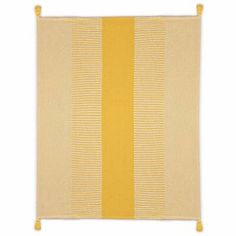 a yellow and white striped rug with tassels on the bottom, in front of a white background