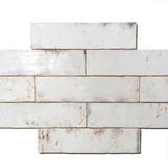 an old white brick wall with rusted paint on the edges and bottom part, against a white background