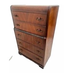 an old wooden dresser with many drawers