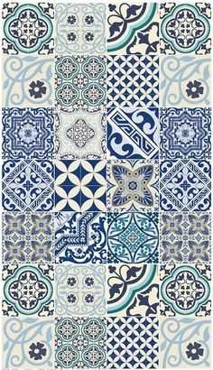 a blue and white patchwork design with many different designs on it's sides