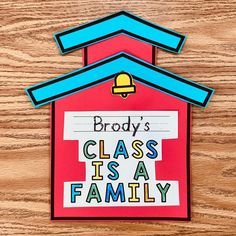 a paper cut out of a house with the words broddy's class is a family on it