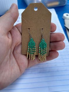 These beautiful green and gold beaded earrings will be the perfect addition to any outfit! Gold Beaded Earrings, Gold Bead Earrings, Writing Thank You Cards, Summer Earring, Colorful Earrings, Pink Summer, Lovely Earrings, Gold Beads, Green And Gold