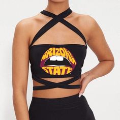 This super flattering Arizona State University Multi Way Bandeau Top is perfect for college game day paired with our Maroon Tailgate Skirt or our ASU Game Day Skirt! Our ASU Multi Way Bandeau Top's stretchy fabric makes it the perfect option for all body types. Adjustable straps allow this top to be worn endless ways and tied to fit you perfectly! FORKS UP! 92% Nylon, 8% Spandex. One size fits most. Officially Licensed by Lo + Jo Bands. College Game Day, College Games, College Game Days, Arizona State University, Arizona State, Night Looks, Bandeau Top, Forks, Stretchy Fabric