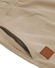 Stay comfortable and stylish on the golf course with our Casual Golf Cargo Shorts. Made from a high-quality blend of cotton and elastane, these shorts offer a lightweight and breathable feel. The drawstring closure provides a secure fit, while the fastening pockets ensure your belongings stay safe. Perfect for a casual round of golf or everyday wear, these shorts are a must-have for any golfer's wardrobe. Features: 98% Cotton, 2% Elastane Drawstring closure Hand Wash Only Quality Fabric: 98% Cot Cotton Golf Bottoms With Built-in Shorts, Cotton Bottoms With Built-in Shorts For Golf, Sporty Cotton Golf Shorts, Beige Cotton Shorts For Outdoor, Casual Cotton Golf Shorts, Casual Golf Bottoms With Side Pockets, Casual Cotton Shorts For Golf, Golf Bottoms With Built-in Shorts In Cotton, Paisley Shorts