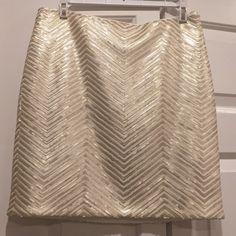 Great Chevron Sequined Pattern - Pared With Your Favorite Top Makes This A Great Holiday Party Skirt. Elegant Gold Mini Skirt For Spring, Elegant Gold Mini Skirt With Lining, Elegant Summer Festive Skirt, White Festive Skirt For Spring, Chic Fitted Skirt For Festive Occasions, Elegant Fitted Mini Skirt For Festive Occasions, Sequined Skirt, Banana Republic Skirt, Party Skirt