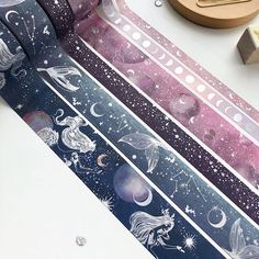 an assortment of space themed washi tapes