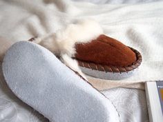 Beautiful and comfortable slippers. Fully Handmade using only natural sheepskin and genuine leather. Our slippers will be an elegant and super comfortable companion for all your evenings :) Thanks to special properties of natural sheepskin you can wear those slippers during the whole year, without worries about overheating your feet or any allergic reactions. Materials: Sheepskin, leather. Soft Sheepskin Slippers With Round Toe, Brown Sheepskin Slippers With Leather Sole, Comfortable Brown Shearling Slippers, Brown Shearling Indoor Slippers, Soft Sheepskin Slip-on Slippers, Winter Brown Slippers With Soft Sole, Brown Sheepskin Slippers With Rubber Sole, Winter Sheepskin Slippers With Rubber Sole, Brown Sheepskin Closed Toe Slippers