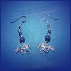 "Friesian Trot Horse Earrings Solid Sterling Silver 925 and Genuine Natural Lapis Lazuli Choose any color gemstone or crystal you like. Pictured is Lapis Lazuli - Gemstones such as onyx, and amethyst, coral and crystals and more are also available. These horse earrings are about 1 1/2\" length. They are from a line of hand carved and cast horse jewelry and are the left and right side of a trotting horse. Light weight for comfort, and sturdy solid chunk of sterling silver with great depth and det Traditional Hypoallergenic Sterling Silver Earrings, Silver Spiritual Hallmarked Earrings, Traditional Hypoallergenic Drop Earrings, Traditional Round Lapis Lazuli Jewelry, Traditional Hypoallergenic Sterling Silver Jewelry, Nickel Free Silver Lapis Lazuli Jewelry, Silver Lapis Lazuli Dangle Earrings, Silver Lapis Lazuli Drop Earrings, Lapis Lazuli Dangle Jewelry