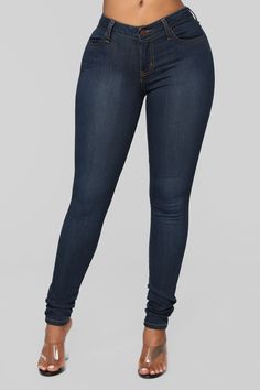 Mid-rise to the occasion! Transition seamlessly from day to night in our Dark Blue Classic Mid-Rise Skinny Jeans. Featuring a five-pocket design and mid-rise, skinny cut, this is a pair of denim you won't know how you ever lived without. Available in Dark Medium, Light, Black, And White Now Available in two inseams! Short - 27", Regular 31" Mid-Rise - 9 1/2" Rise Skinny Leg 2 Functional Front Pockets 2 Functional Back Pockets Super Stretch Fabric Disclaimer: Due To The Specialized Wash Process, Denim Style Casual, Yoga Jeans, Stretch Denim Pants, Jeans Long, Fashion Sites, Outfit Trends, Dark Blue Jeans, Fashion Nova Jeans, Fashion Weeks