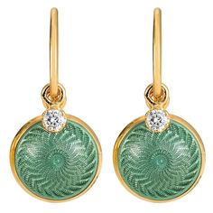 Victor Mayer round drop earrings 18k rose gold and yellow gold, Candy collection, translucent light turquoise vitreous enamel, 2 diamonds total 0,08 ct, G VS, diameter app. 10.0 mm About the creator Victor Mayer Victor Mayer is internationally renowned for elegant timeless designs and unrivalled expertise in historic craftsmanship. Lovers of the extraordinary appreciate the beauty of Victor Mayer's designs, which use extremely rare techniques such as genuine enamel or elaborate engravings. Since Blue Enamel Earrings, Ear Jewellery, Gold Candy, Candy Collection, Jewelry Photography Styling, Diamonds Earrings, Vitreous Enamel, Photography Styling, Abstract Geometric Pattern