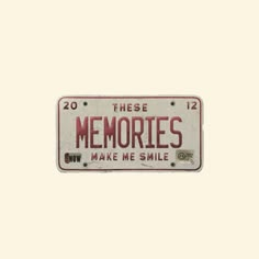 an old license plate that says, these memories make me smile