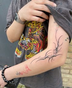 a person with a tattoo on their arm