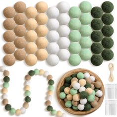 felt balls, beads and knitting needles are arranged on a white surface next to a wooden bowl