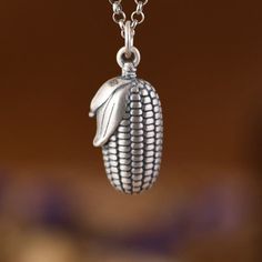 990 Sterling Silver Corn Necklace Pendant, Corn Jewelry, Food Charms, Candy Corn Charms, Halloween Charms, Corn Cob Charm, Food Jewelry  (Not Including Chain) Material: 990 fine silver Weight: 1.8g * We guarantee 100% genuine 990 Sterling Silver, If not we will refund your money. Care Instruction : 1. Avoid contact with all liquids and chemicals, such as perfume, sea water, mayonnaise, ammonia, chlorinated pool water, hair spray and sweat. Contact with these substances will increase the rate at Corn Jewelry, Charms Candy, Water Hair, Corn Cob, Food Charms, Halloween Charms, Corn On Cob, Food Jewelry, Hair Spray