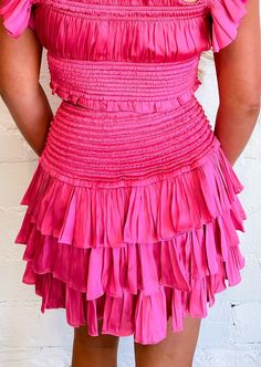 Twirl into feminine charm with this pink 3-tiered skirt, a delightful and playful ensemble that effortlessly combines flounce and style for a whimsical and fashionable look. 100% Polyester Dry Clean Only Meet Hannah! Height: 5’6” Hips: 34” Bust: 33” Waist: 25” Wearing Size: Small Ruffle Skort, Seychelles, Tiered Skirt, Hot Pink, Dry Clean, Skirt, Pink, How To Wear