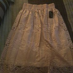 Powder Pink High Lace Waisted Skirt Chic Lace Skirt For Brunch, Spring Lace Skirt For Day Out, Lace Lined Skirt For Day Out, Lace Skirt For Day Out, Day Out Lace Tiered Skirt, Spring Lace Midi Skirt, Lace Tiered Skirt For Day Out, Spring Knee-length Lace Skirt, Purple Pencil Skirt