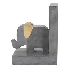 an elephant figurine is shown on a white background and it looks like he's holding something in his trunk