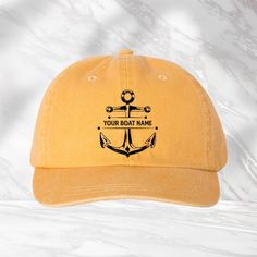 Custom Boat Owner Name Hat, Personalized Nautical Cap, Sailor Hat, Cruise Vacation Hat, Sea Lover Gift, Boating Life Cap, Anchor Hat We use DTF Vinyl Heat Pressed Design. Mega Cap - Pigment Dyed Cotton Twill Cap - 7601A - 100% cotton pigment dyed twill - Unstructured, six-panel, low profile - Self-fabric sweatband and six sewn eyelets - Self-fabric strap with brass snap buckle and sewn grommet - Adult Sizing: 6 5/8" - 7 3/8" Nautical Cap For Boating, Nautical Style Cap For Boating, Ocean Cabin, Boating Life, Gifts For Boat Owners, Vacation Hat, Heat Press Designs, Sailor Hat, Anchor Design