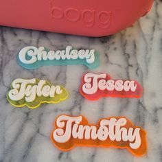 "Gear up for summer or your tropical getaway with this two toned personalized Bogg Bag Monogram in our fun trendy font. Choose from a variety of background colors and then top it with solid white or black.  Each layer is 1/8\" acrylic. The bogg button on the back is 3D printed in PLA and attached with E6000.  Do not pull to remove from the front. Push the charm out from the back.  Acrylic can break if it hits a hard surface with enough force." Bogg Bag Aesthetic, Bogg Bag Tassel, Bogg Bag Charms, Bogg Bag Accessories, Glowforge Projects, Baseball Bag, Pool Bag, Trendy Fonts, Bogg Bag