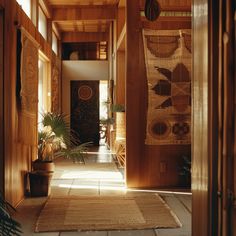 the hallway is lined with wooden paneling and plants