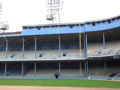 an empty baseball stadium filled with lots of seats