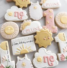 decorated cookies are arranged on a table