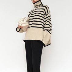 The changing black and white stripes are rich in layering. Wide cuffs and high collar design, warm and fashionable. There are two materials to choose from. Gender: Woman Season: Autumn / Winter Style: simple and casual Type: loose hedging Collar type: high collar Thickness: Thicker Sleeve length: long sleeves Sleeve type: flared sleeves Length: Normal Fabric name: Knitted Fabric composition: Wool Blend Pattern: Stripe Size Length Bust Shoulder Sleeve S 60cm 128cm 51cm 52cm M 62cm 132cm 53cm 53cm L 64cm 136cm 55cm 54cm Crochet Clothing, Loose Pullover, Black And White Stripes, Wide Cuff, Collar Designs, Season Autumn, Winter Style, White Sweaters, Black Wool