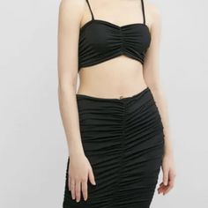 This Two-Piece Rouched Set Is Very Slinky And Sexy. The Top Is Rushed In The Front And Then That Detail Follows All The Way Down The Skirt Where You Can Adjust It With The Two Strings To Be Shorter Or Longer. The Size Says 3x But It Fits Like A 2x. Fitted Ruched Elastane Crop Top, Flirty Fitted Ruched Crop Top, Fitted Ruched Crop Top, Fitted Ruched Tops For Club, Flirty Stretch Crop Top For Date Night, Ruched Bodycon Tops For Night Out, Bodycon Ruched Tops For Night Out, Ruched Stretch Crop Top For Party, Fitted Ruched Crop Top For Party