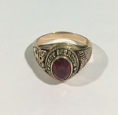 Hi, Here we have a beautiful 14k yellow gold east meadow 2001 Markella high school ring. Weigth: 7.5g. Width: 13.5mm. The perfect gift for your loved one. Comes with a free gift box. Ring is pre owned and will show normal wear but in excellent condition. Main Stone Color:Red Main Stone Shape:Oval Main Stone:Ruby Ring Size:8.5 Ring Shape:Oval Occasion:Graduation Sizable:Yes Main Stone Creation:Lab-Created Classic 14k Gold Engraved Ring For Commemoration, Classic Engraved Ring Stamped 14k For Commemoration, Oval 14k Gold Signet Ring For Commemoration, 14k Gold Oval Signet Ring For Commemoration, Oval 14k Gold Commemorative Rings, Classic 14k Gold Birthstone Ring Collectible, Oval 14k Stamped Commemoration Ring, Oval 14k Gold Commemoration Ring, Oval 14k Stamped Commemorative Rings