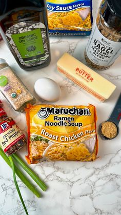 ingredients to make macaroni and cheese soup laid out on a marble counter top