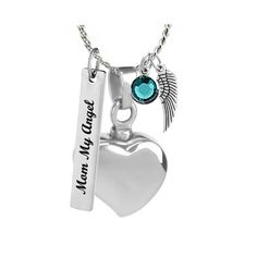 a heart shaped necklace with an angel charm and a name tag hanging from the front