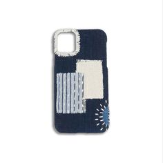 a cell phone case with blue and white patchwork