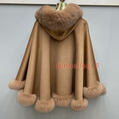 Beige Cape For Cold Weather In Fall, Winter Poncho Cape For Cold Weather, Winter Beige Poncho For Cold Weather, Brown Winter Cape For Cold Weather, Winter Beige Cape For Cold Weather, Beige Winter Cape For Cold Weather, Beige Winter Cape, Beige Hooded Poncho For Fall, Brown Cape For Cold Weather