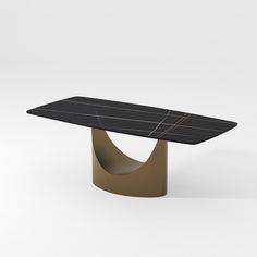 a black and brown table sitting on top of a white floor