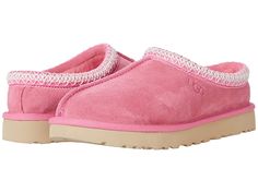 UGG Tasman - Women's Shoes : Pink Rose : The Tasman always fits tight at first especially if someone has a high instep or high volume foot. It does stretch out over time. If you are in between sizes, please size up or down based on the volume of your foot and height of your instep. Take the suede UGG Tasman slip-on from weekday lounging to a Saturday excursion! Features a Tasman trim and a raw seam down the center with an embossed UGG logo at lateral side. Luxurious sheepskin lining for breathab Light Pink Tasman Uggs, Ugg Slippers Pink, Luxury Items Women, Pink Tasman Uggs, Stuff To Get For Christmas, Pink Cute Stuff, Light Pink Uggs, Preppy Uggs, Slip On Uggs