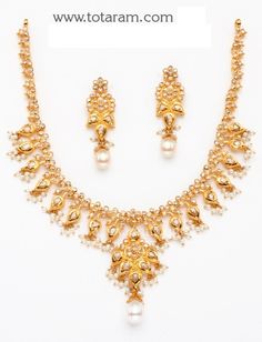 22 Karats Gold Uncut Diamond Necklace & Long Earrings Set with Pearls 
   Gross Gold Weight: 40.300 - 41.300 grams 
   Total Uncut Diamond Weight: 9.75 Carats
    - 235-DS236 - in 41.300 Grams for USD $4684.09. 
Made in India by Totaram Jewelers Online this product is in Gold - 22 Karat BIS Hallmark 916 KDM Gold  & is an excellent gift for Adult - Women. Ships fully insured with secured guaranteed delivery for free with your order over $250 from New Jersey USA & comes with 30 day Diamond Necklace Long, Uncut Diamond Necklace, Indian Gold Jewelry, 22k Gold Necklace, 22k Gold Jewelry, Gold Jewelry Stores, Diamond Necklace Set, Gold Necklace Set, Gold Jewelry Indian