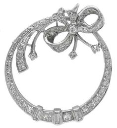 This is a stunning 14k white gold pin from the Art Deco era. The pin is set with sparkling baguette and round cut diamonds that weigh approximately 3.70ct. The color of the diamonds is H-I with VS1 clarity. The pin measures 39mm by 33.5mm and weighs 7.9 grams. Argentium Silver Jewelry, Wedding Brooch, Gold Pin, Sapphire Wedding, Argentium Silver, Art Deco Era, Diamond Fashion, White Sapphire, Round Cut Diamond