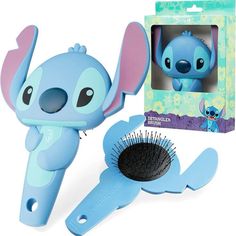 a blue toy with a hair brush next to it's box and packaging on the side