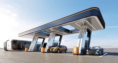 two cars are parked in front of an electric car charging station on the pavement, under a blue sky with white clouds