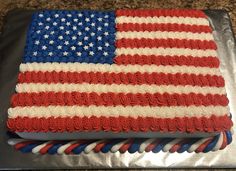 an american flag cake with red, white and blue icing