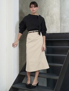 This product is a curved mermaid skirt that offers a classic silhouette with a modern twist. The skirt hugs the hips and thighs before flaring out at the knee, resembling the elegant shape of a mermaid's tail. Its structured design provides a sophisticated look that's suitable for professional and formal occasions. - The skirt features a high waist and a flared hem, creating a flattering mermaid-like silhouette.- Its sleek design is complemented by a subtle curve that enhances the body's natural lines.- Constructed from a firm, high-quality fabric, it maintains its shape and provides a polished appearance.- The skirt pairs well with fitted tops or blouses, offering versatility in styling options. Elegant Wrap Pencil Skirt For Work, Elegant Pencil Wrap Skirt For Work, Fitted Wrap Skirt For Workwear, Chic Fitted Wrap Skirt For Work, Chic Fitted Wrap Skirt For Office, Formal Fitted Midi Wrap Skirt, Elegant Fitted Knee-length Wrap Skirt, Chic Wrap Pencil Skirt For Work, Chic Pencil Wrap Skirt For Work