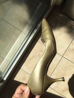 "Circa: 1950s 1960s Add some zing! into your wardrobe with a pair of Muted Gold patent leather heels. Unusual colour and still wearable in a modern fitting. Might be more of an 8 modern and nice width. A classic style of heel with a lovely point (not too extreme!) and an easy, walkable 3\" heel. Get those ooohs and aaaaahs going. DO YOU ACCEPT OFFERS? We do NOT accept offers or negotiate on pricing. We do offer layaways and have sales throughout the year. Shipping overages are always refunded. L Retro Closed Toe Heels For Formal Occasions, Retro Fitted Almond Toe Court Shoes, Retro Formal Closed Toe Heels, Retro Almond Toe Fitted Court Shoes, Vintage High Heel Kitten Heels For Spring, Retro Fitted Low Heel Shoes, Retro Fitted Low Heel, Fitted Retro Low Heel, Elegant Pointed Toe Heels For Vintage Fashion