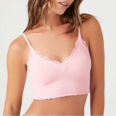 Nwt Forever 21 Baby Pink Seamless Seamless Lace-Trim Cropped Tank Top Details A Seamless Knit Bralette Featuring A Ribbed Construction, V-Neckline, Lace Trim, Adjustable Cami Straps, Straight-Cut Back, And Lettuce-Edge Hem. Content + Care - Shell 1: 60% Viscose, 38% Nylon, 2% Spandex - Shell 2: 90% Nylon, 10% Spandex - Machine Wash Cold Size + Fit - Model Is 5'7" And Wearing A Small Absolutely Adorable Love The Color And The Fit Size Medium Brand New Knit Bralette, Cropped Tank Top, Forever 21 Tops, Straight Cut, Crop Tank, Baby Pink, Bralette, Lace Trim, Fitness Models