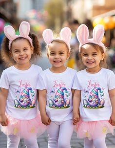 Embrace the joys of Spring and celebrate Easter in style with our Cute Happy Easter T-shirts! Every shirt is infused with the spirit of egg hunting and designed with love, making them the perfect addition to your festive wear. 👚 Available in a variety of comfortable materials: - Smooth and soft DTF transfer details for a touch of shine - High-quality Bella Canvas Tees for ultimate comfort - Cozy Gildan Sweatshirts perfect for chilly mornings - Lightweight Gildan Soft Style Tees for a breathable Playful Easter Short Sleeve T-shirt, Playful Short Sleeve T-shirt As Gift, Playful Easter Tops With Graphic Print, Easter Graphic Print Playful Tops, Cute Short Sleeve Easter T-shirt, Playful Short Sleeve Tops For Easter, Fun Short Sleeve Tops For Gifts, Cute Crew Neck Easter Tops, Easter Pink Cotton T-shirt